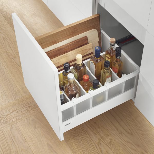 Orga-line drawer dividers provide easy to bottle and chopping board storage